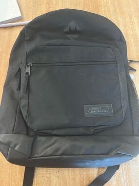 Dickies Black Canvas Backpack School Work Bag with Mesh Pocket and Padded Straps